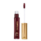Lip volumizer with maroon color and gold applicator on a white background
